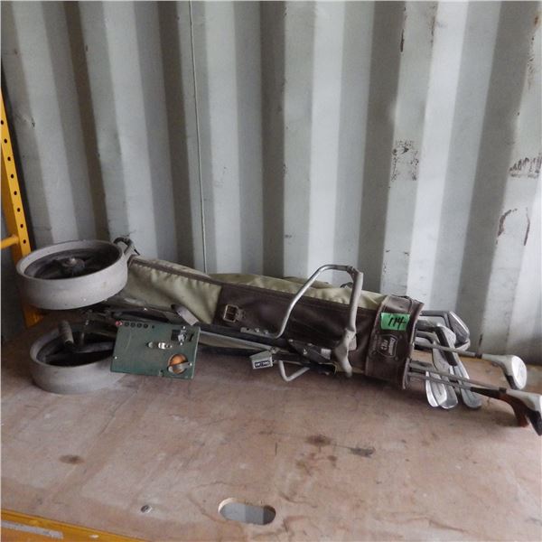 Set of golf clubs and bag with cart