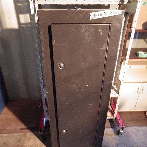 Locking firearms storage cabinet with key