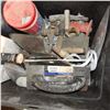 Image 1 : Trowels and tools for working with grout