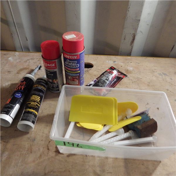 Cans of spray adhesive and bodyworking items