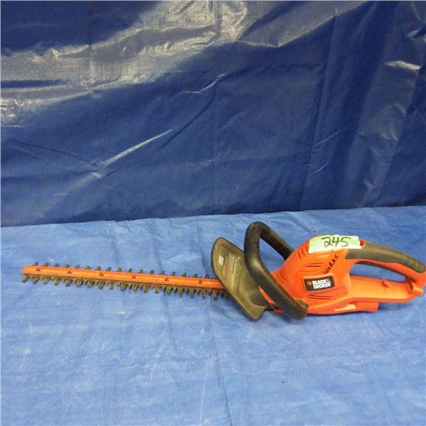 Black and Decker hedge trimmer - working