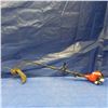 Image 1 : Homelite gas string trimmer with spool of line
