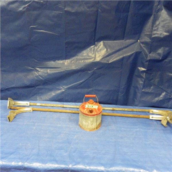 Red metal one gallon gas can and old car top carrier set