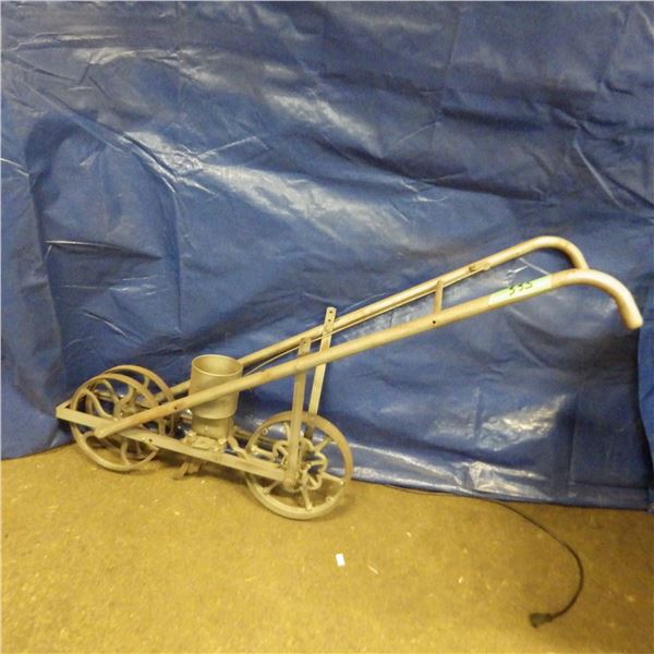 Antique walk behind seeder - paintable for yard decoration
