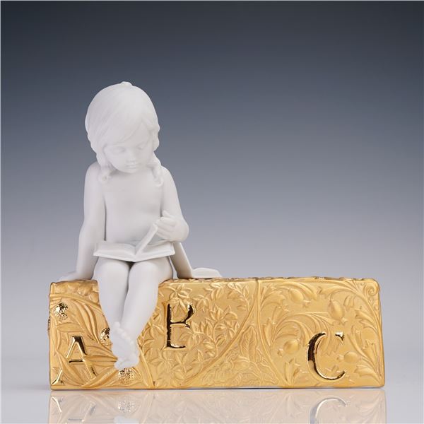 Lladro Porcelain Figurine, Learning Orlando (Gold) 01007462