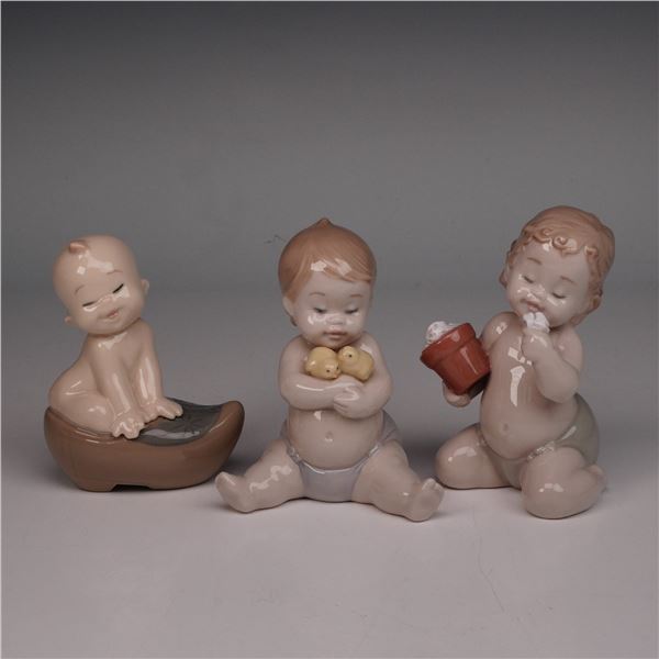 Three NAO by Lladro Figurines from the 'Where Do Babies Come From' Series