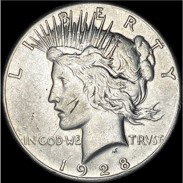 1928 Silver Peace Dollar NEARLY UNCIRCULATED