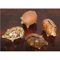 Four Ceramic Piggie Banks