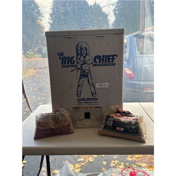 The Big Chief Electric smoker new cord and some chips