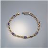 Image 1 : 14K Yellow Gold 3.15ctw Tanzanite and 0.17ctw Diamond Bracelet