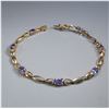Image 2 : 14K Yellow Gold 3.15ctw Tanzanite and 0.17ctw Diamond Bracelet