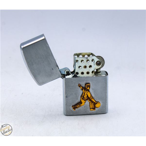 VINTAGE PENGUIN CURLING THEMED LIGHTER