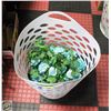 Image 1 : LAUNDRY BASKET FULL OF SILK FLOWERS