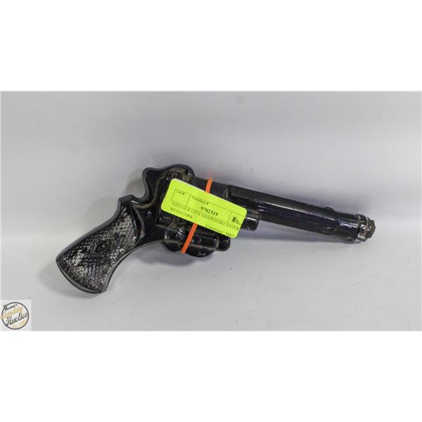 VINTAGE GUN SHAPED DECANTER WITH CORK