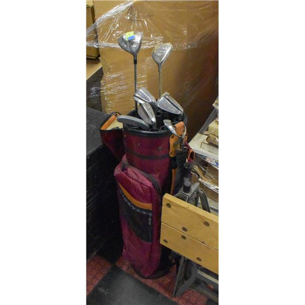 RED VINTAGE GOLF BAG WITH VARIOUS CLUBS