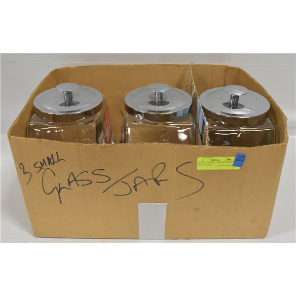 BOX CONTAINING 3 SMALL GLASS STORAGE JARS