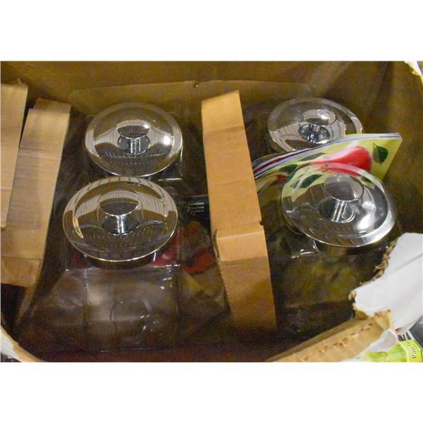 BOX CONTAINING 4 SMALL GLASS STORAGE JARS