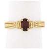 Image 1 : Simple 14K Yellow Gold Oval Prong Set Garnet w/ Grooved Sides Solitaire Ring