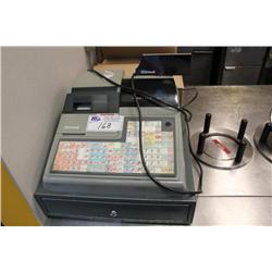 uniwell cash register with supplies