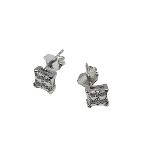 STERLING SILVER NATURAL DIAMOND (0.07CT) EARRINGS, W/A $255.00. DIAMOND IS THE BIRTHSTONE FOR APRIL.