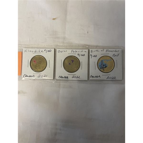 3 SPECIAL COLOURED $1 COINS 2021 KLONDIKE, 2022 O PETERSON, 2022 AG BELL