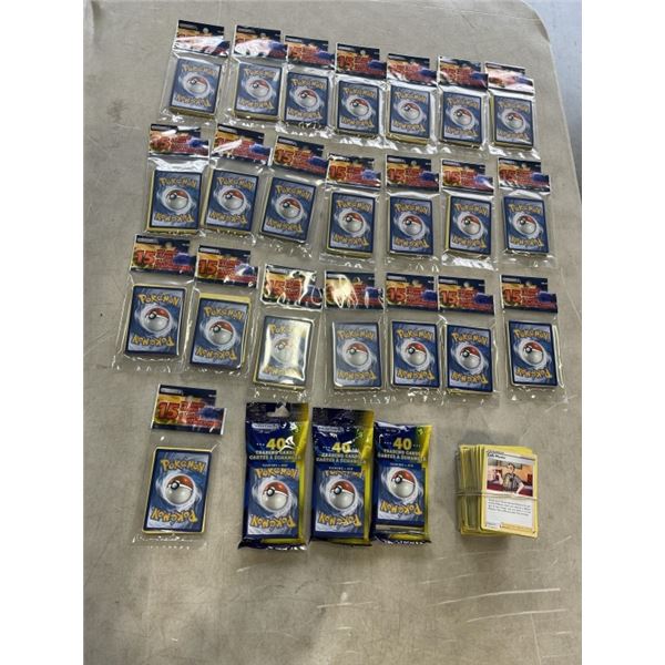 25 UNOPENED PACKS OF POKEMON CARDS AND STACK OF ASSORTED POKEMON CARDS