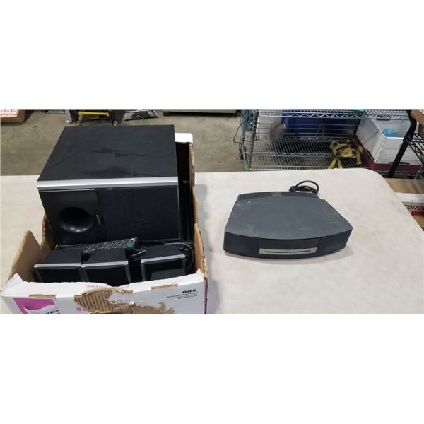 BOSE WAVE MUSIC SYSTEM, AND SONY SURROUND SOUND SPEAKERS AND SUN