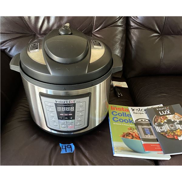 Insta Pot with recipe books