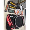 Image 1 : Wheel Chucks, Jump Starter, Replacement Trimmer Blades, Tens Unit, Floor Mats