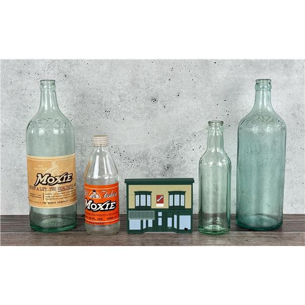 Collection Of Moxie Soda Bottles