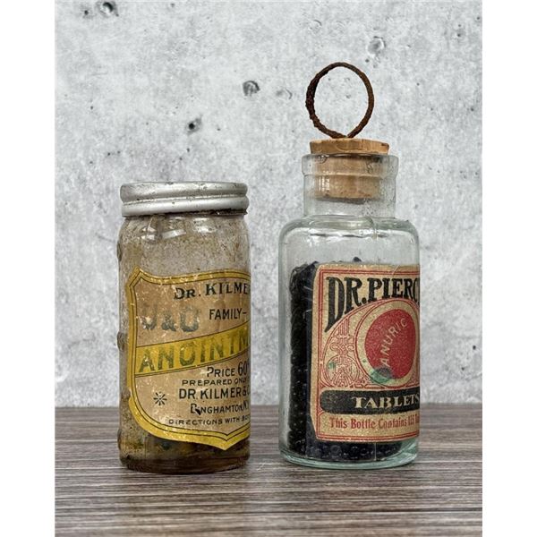 Pair Of Early Snake Oil Cure Bottles