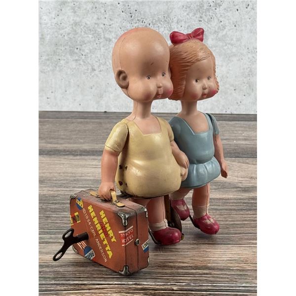 Henry & Henrietta Travelers Celluloid Wind Up Toy