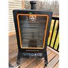 PitBoss brand series 7 wood pellet smoker with cover