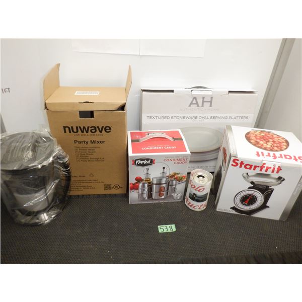 Assorted kitchen items including Party Mixer, condiment caddy, Starfirt brand kitchen scale, oval se