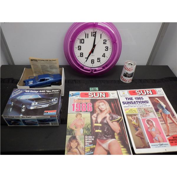 1969 Dodge 440 model kit, wall clock and 1986, 1985 Sunshine girl special edition newspapers