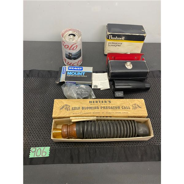Collection items including self blowing predator call, riffle/pistol mount and more