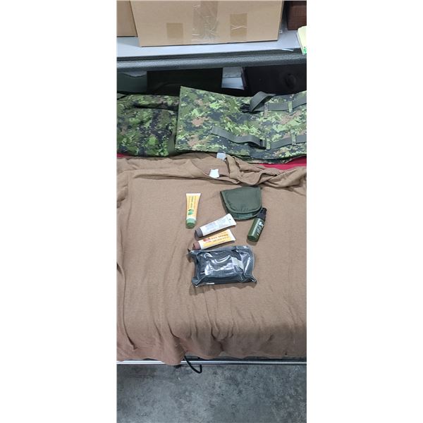 ASSORTED MILITARY ITEMS: SEWING KIT, THREE XL BROWN SHIRTS, ANTI STATIC LENS CLEANER, TRAUMA WOUND D