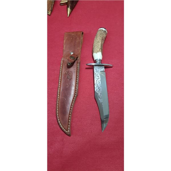 OJEDA BOWIE WITH ANTLER HANDLE AND ETCHINGS ON THE BLADE. COMES WITH SHEATH