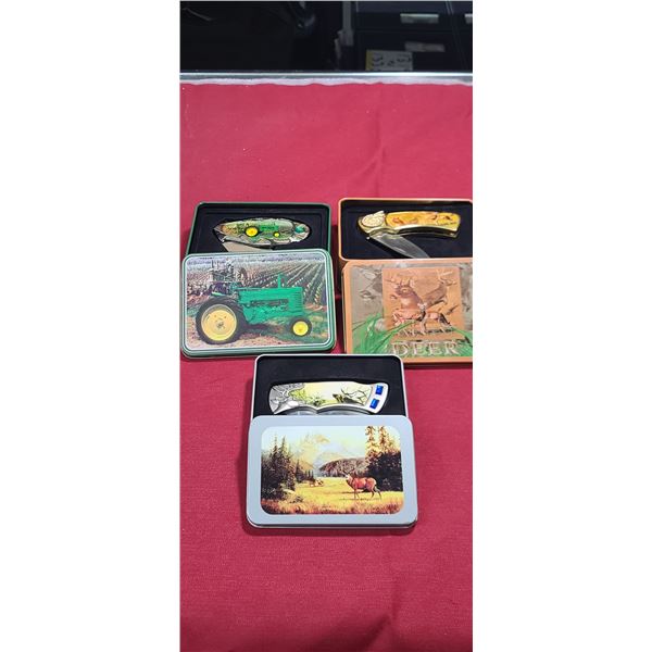 THREE DECORATIVE POCKET KNIVES IN TINS