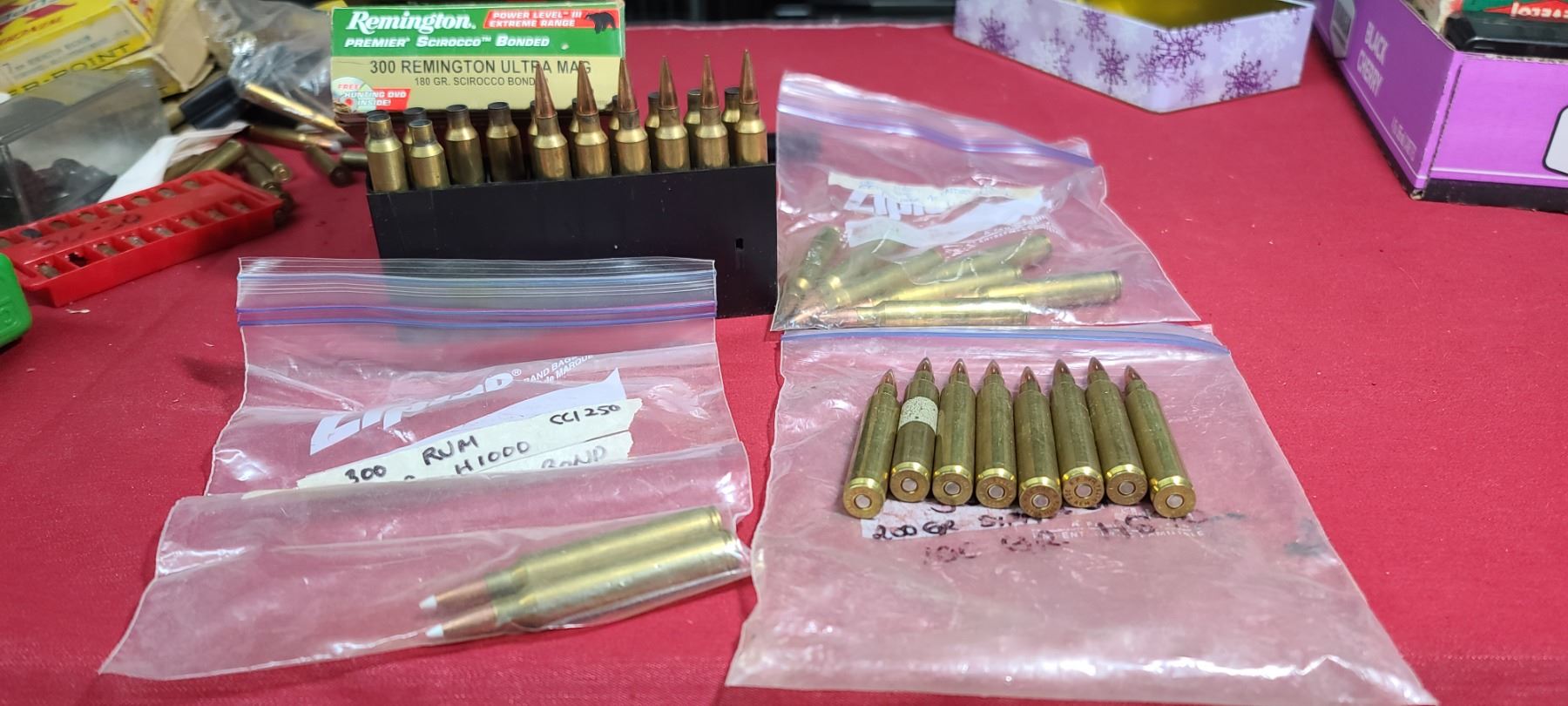 QTY23 ROUNDS OF .300RUM: SIX 180 GR SCIROCCO BONDED, EIGHT 200GR SIERRA ...