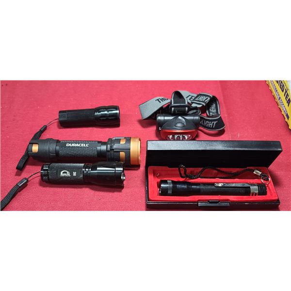 FOUR FLASHLIGHTS AND ONE HEADLAMP