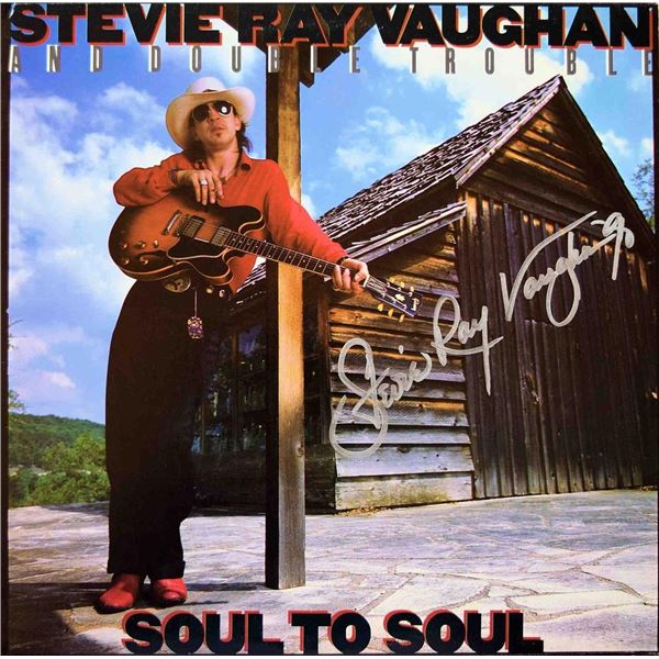 Stevie Ray Vaughan and Double Soul To Soul signed album