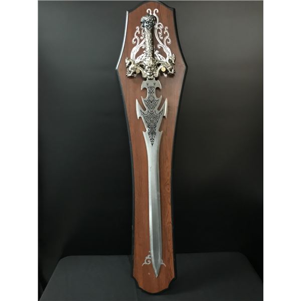 LARGE METAL SWORD ON WOODEN BACKING (NOT SIGNED)