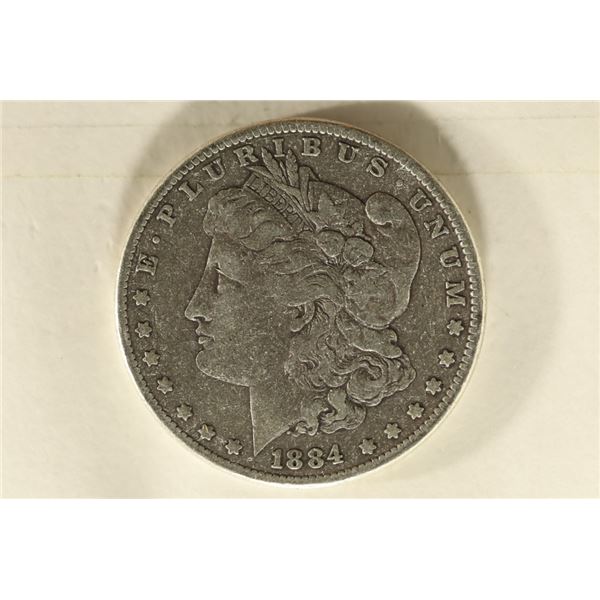 1884 MORGAN SILVER DOLLAR WHIZZED