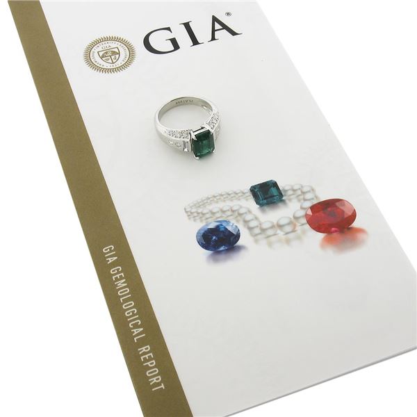 Platinum 3.67 ctw GIA Octagonal Green Emerald w/ Baguette & Round Diamond Ring