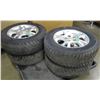 Image 1 : 4 - 215/65R16 GOODYEAR ULTRA GRIP ICE TIRES (APPROX. 70% LEFT ON RAM MAG WHEELS)