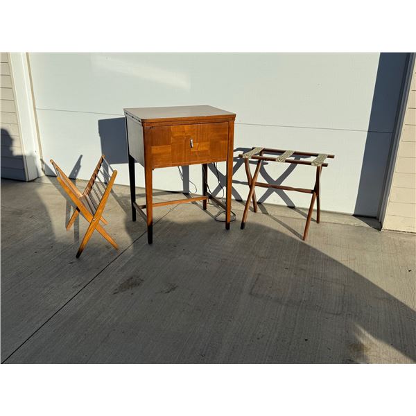 NECCHI SEWING MACHINE IN MIDCENTURY CABINET, LUGGAGE RACK, AND FOLDING MAGAZINE RACK