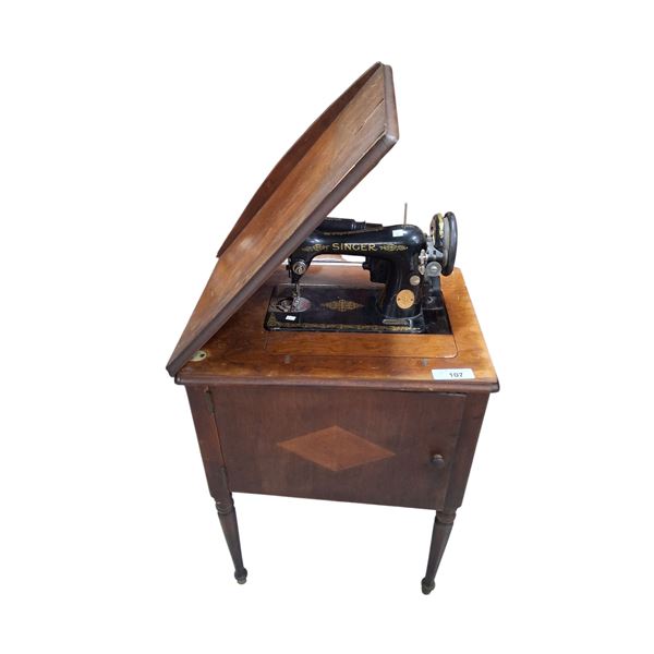 1920s Singer sewing machine in cabinet with cord