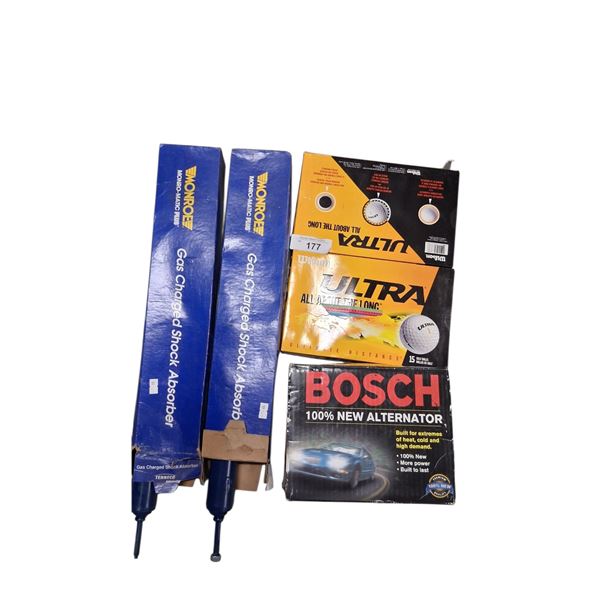 Misc lot inc Bosch alternator, shock absorbers, & 2 boxes of NIB golf balls
