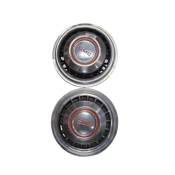 Pair of vintage GMC motorhome hubcaps